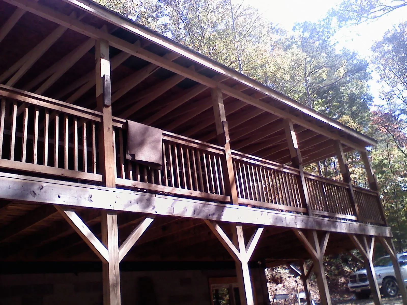 Timber framing under a new elevated porch and deck — Roof Leak Repair in Castile by Roofing Brothers
